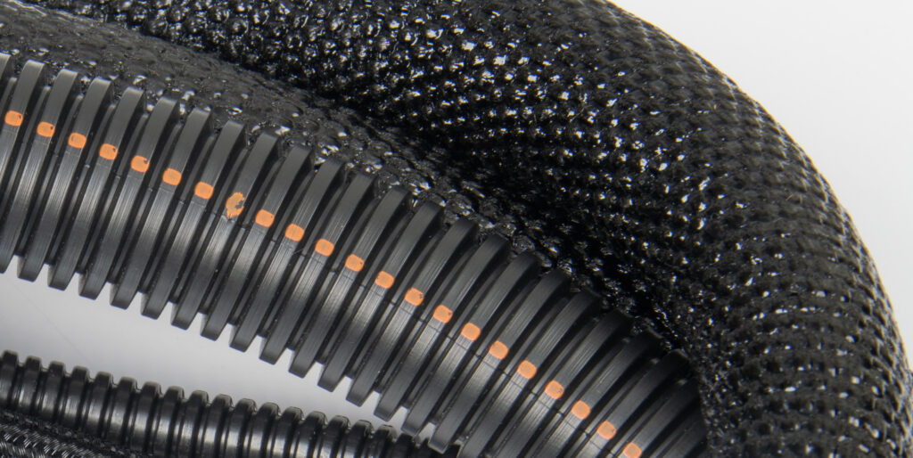 Rigid Conduit Loom vs. Smooth Braided or Knitted Sleeving Loom